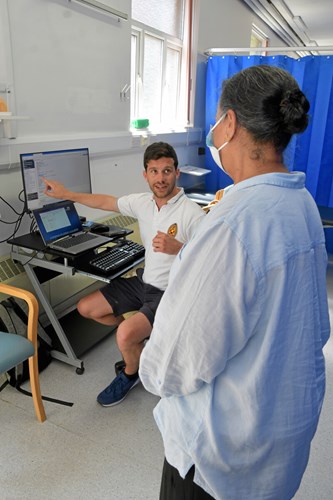 two staff members talking on our ward
